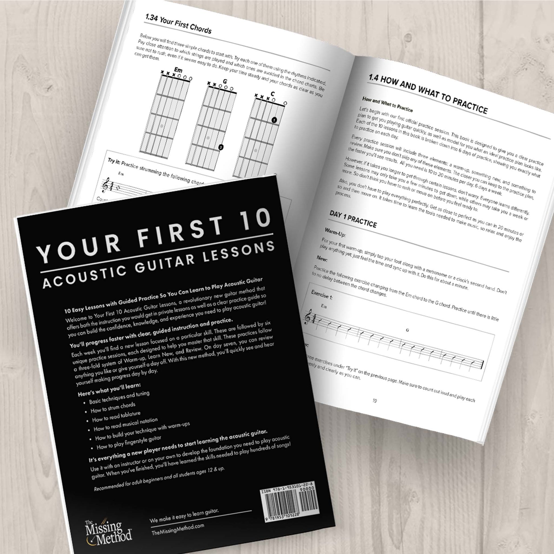 Your First 10 Acoustic Guitar Lessons from The Missing Method for Guitar. Image of two copies of the book on a table, one open to display pages in the first lesson, and the second closed, displaying the back cover.