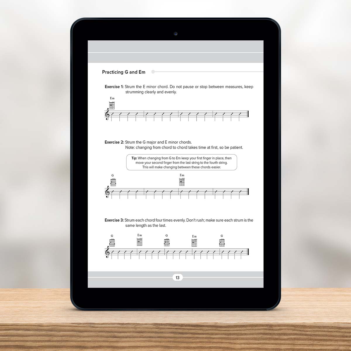 Digital Tablet showing a page from Guitar Chord Master Book 1 by Christian Triola