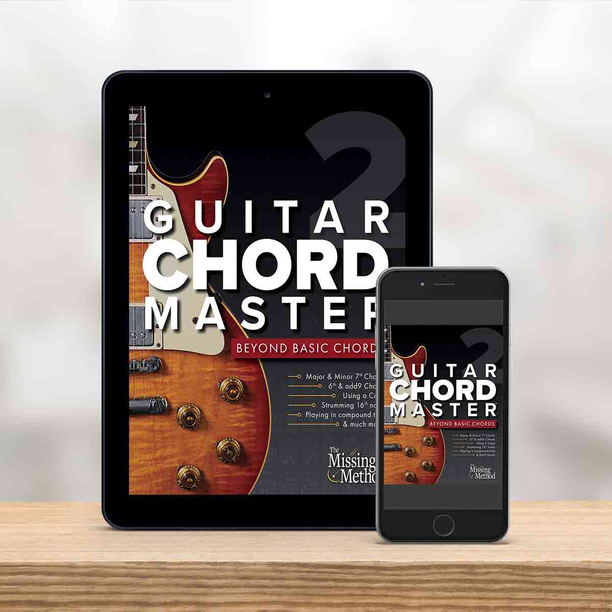 Digital Tablet and smartphone showing the cover of Guitar Chord Master Book 2 by Christian Triola
