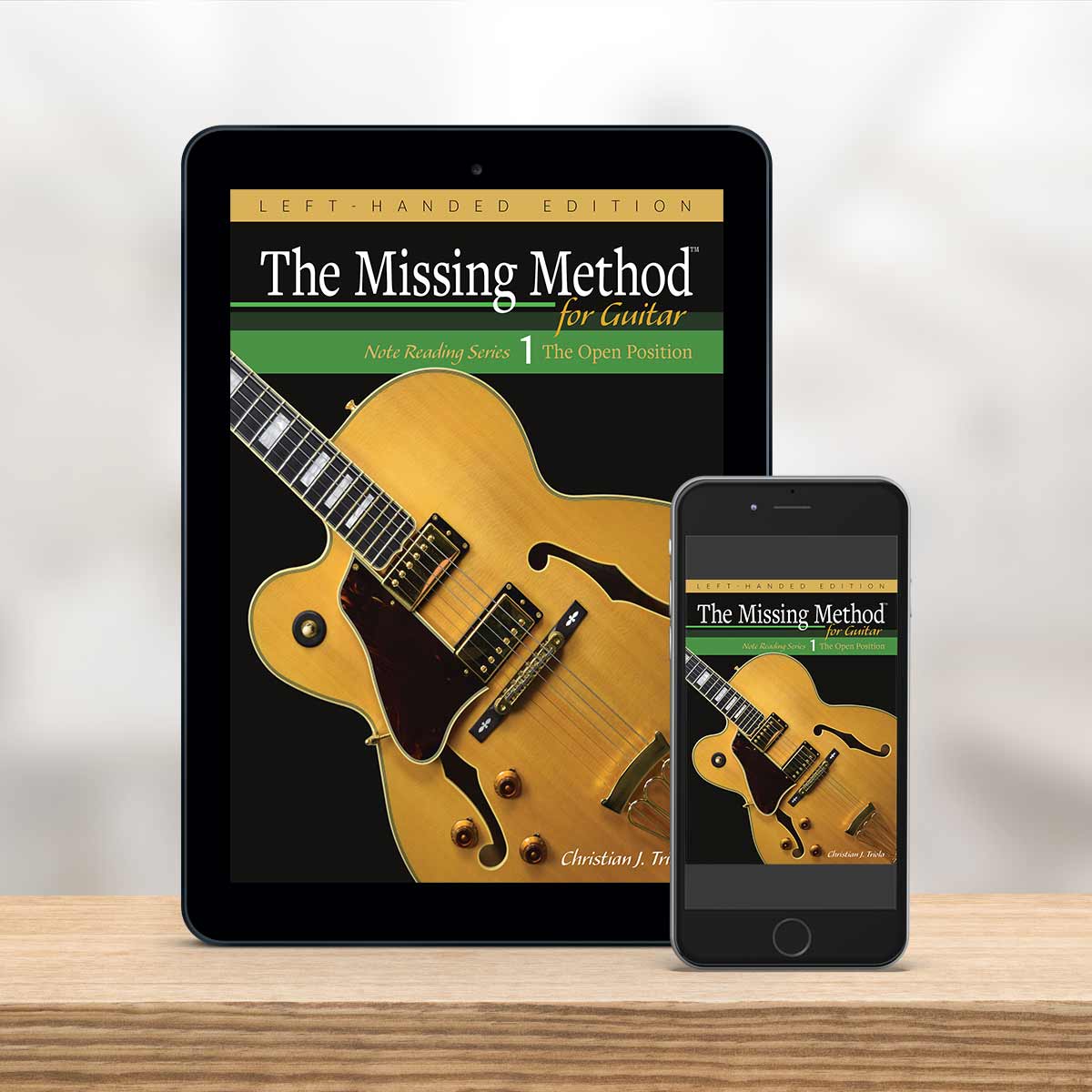 Digital Tablet and smartphone showing the cover of The Missing Method for Guitar Note Reading Series Book 1, Left-Handed Edition by Christian Triola