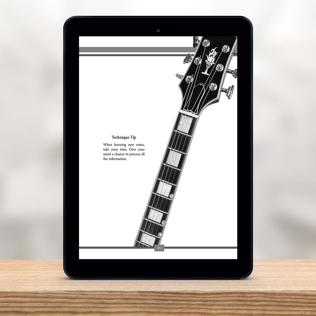 Digital Tablet showing a page from The Missing Method for Guitar Note Reading Series Book 2 by Christian Triola