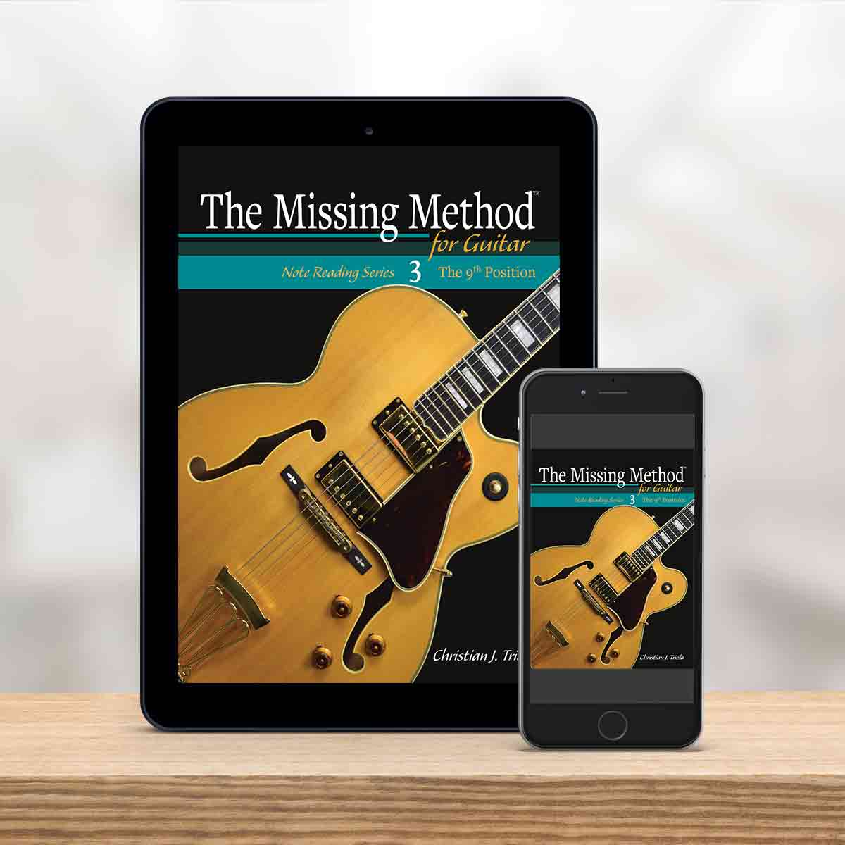Digital Tablet and smartphone showing the cover of The Missing Method for Guitar Note Reading Series Book 3 by Christian Triola