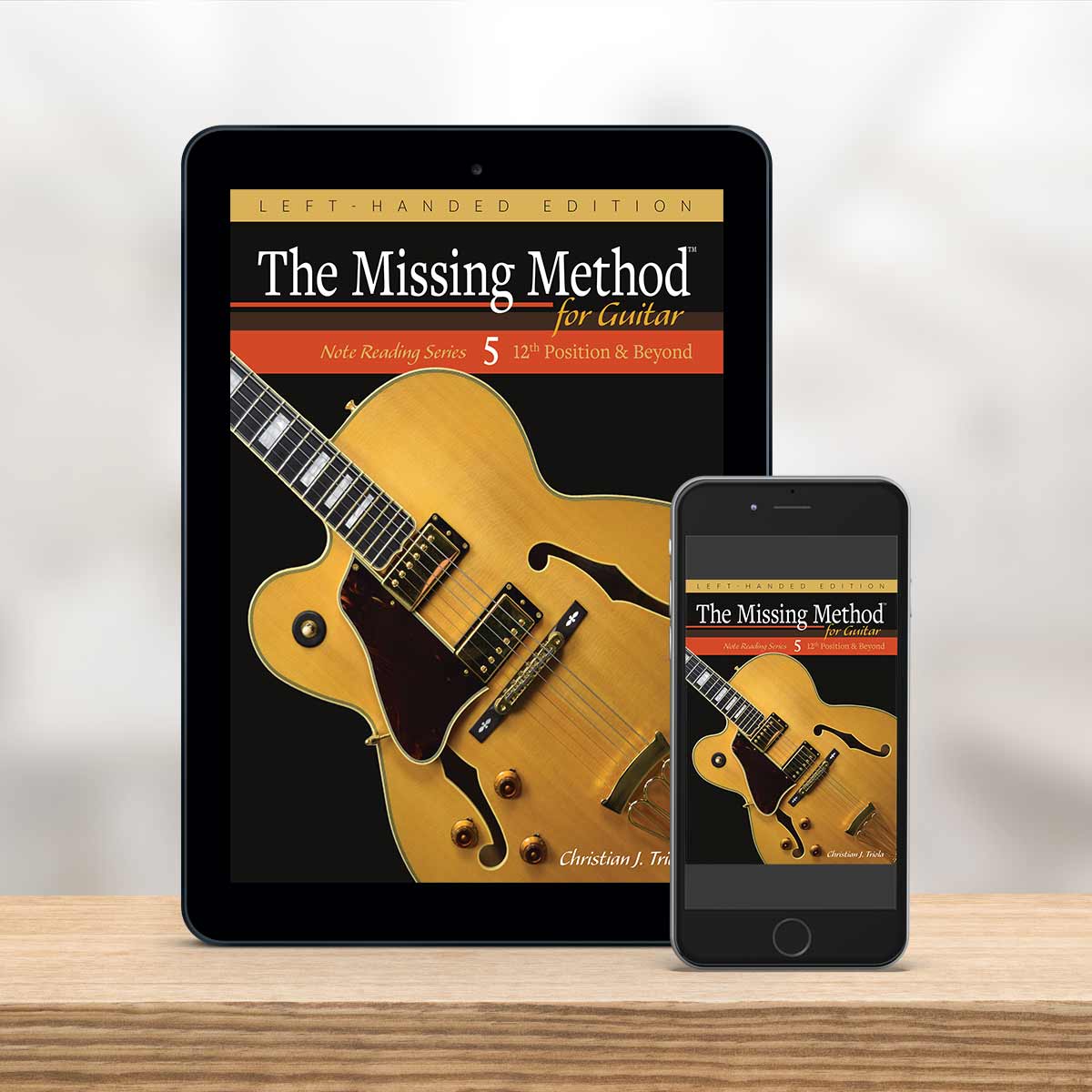 Digital Tablet and smartphone showing the cover of The Missing Method for Guitar Note Reading Series Book 5, Left-Handed Edition by Christian Triola