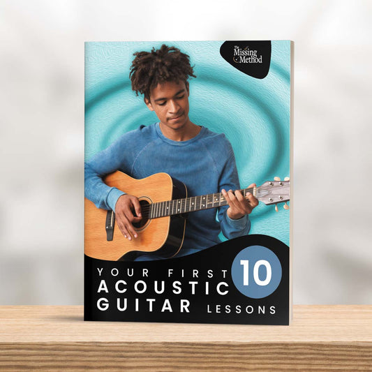 Your First 10 Acoustic Guitar Lessons from The Missing Method for Guitar. Image of book on shelf, displaying the front cover.