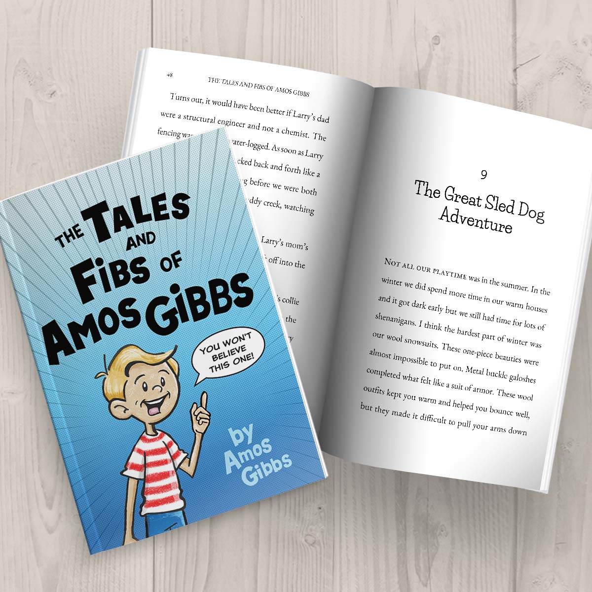 The Tales and Fibbs of Amos Gibbs by Amos Gibbs paperback book open on table and another copy on top displaying the front cover