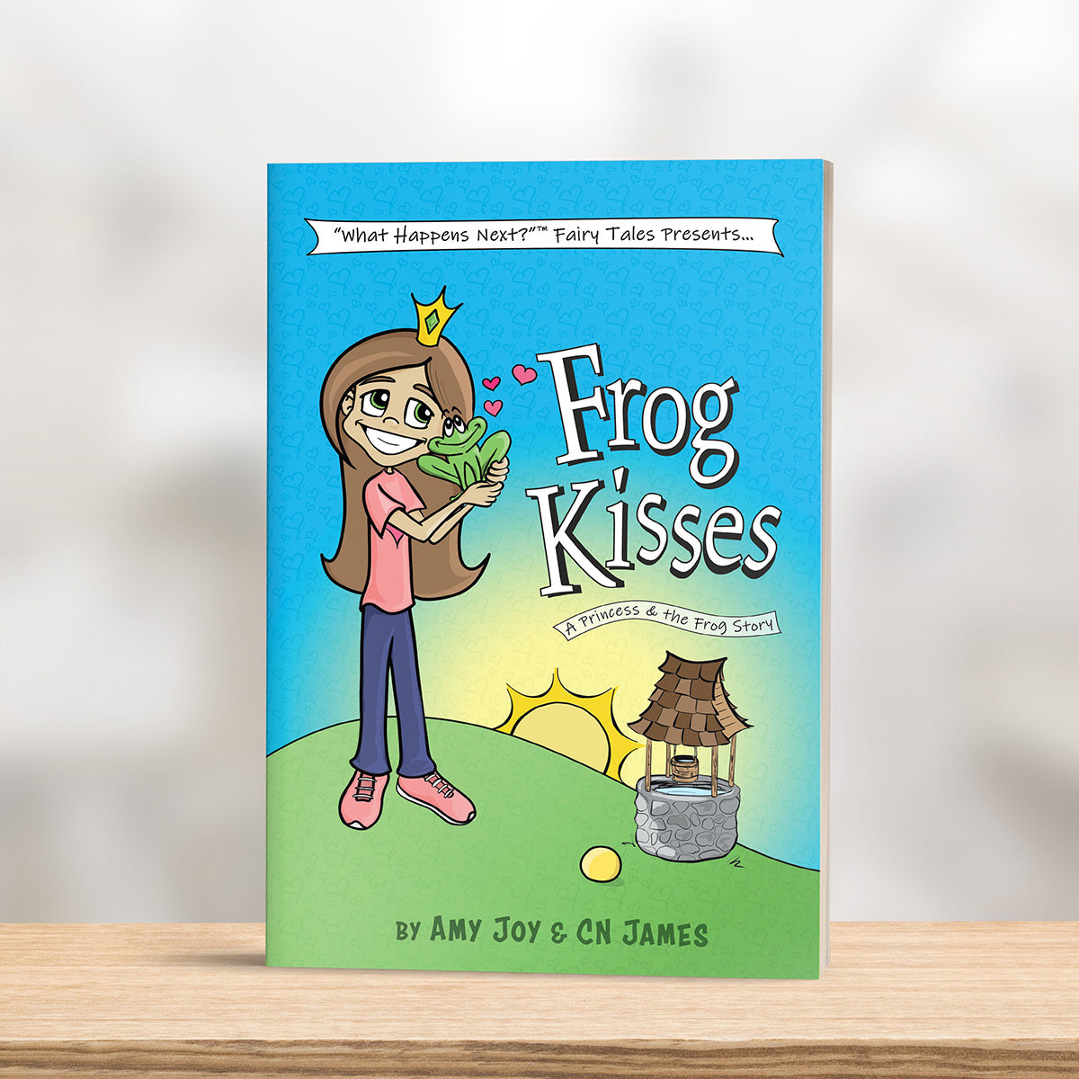 Paperback edition of Frog Kisses by Amy Joy and CN James on shelf