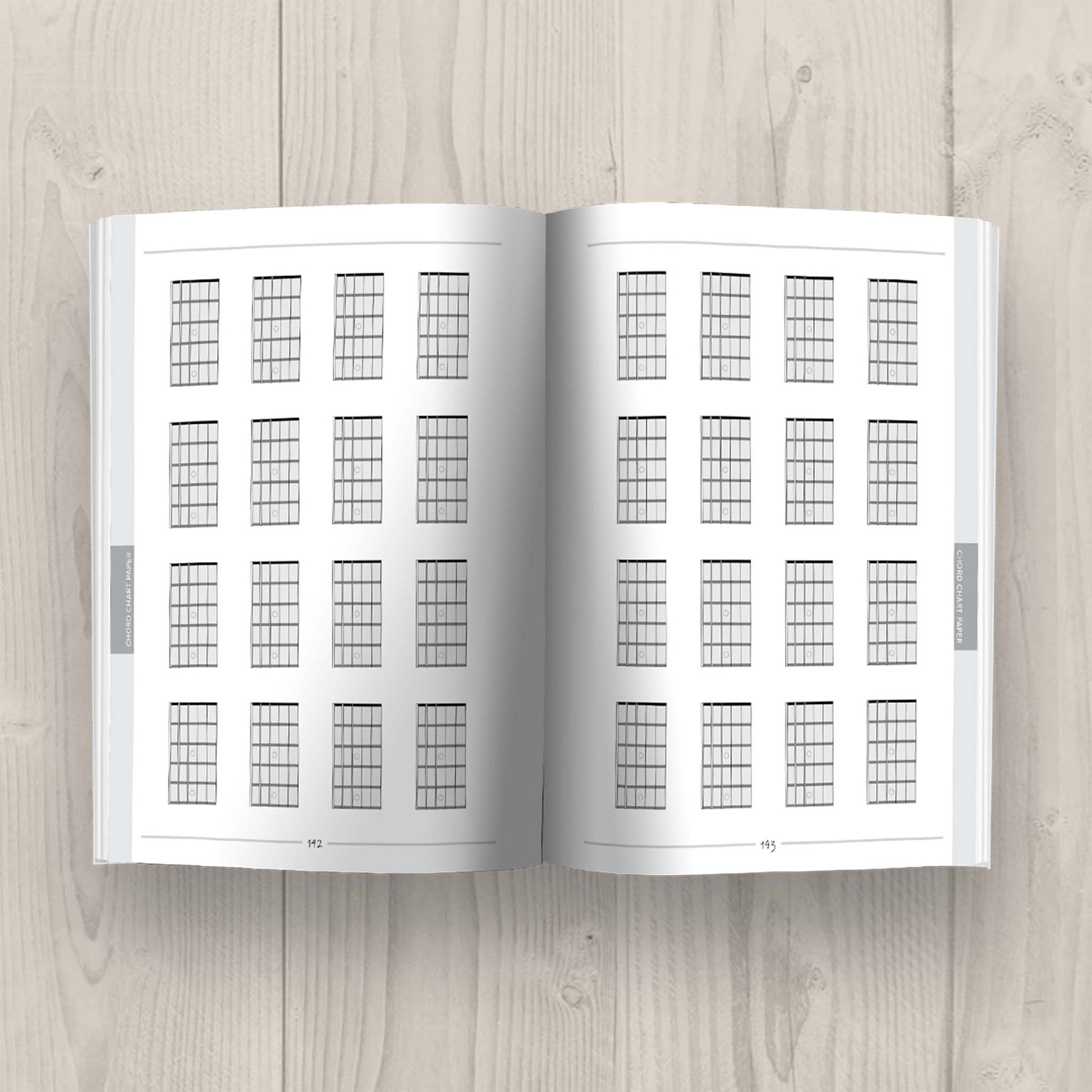 Guitar Sheets Collection Book from The Missing Method for Guitar. Book interior displaying pages 142-143 of blank chord chart paper