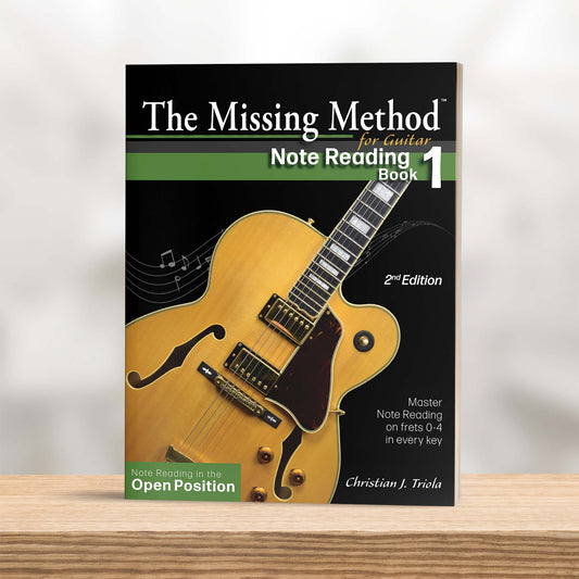 The Missing Method for Guitar Note Reading Book 1 Paperback on shelf with Front Cover displayed