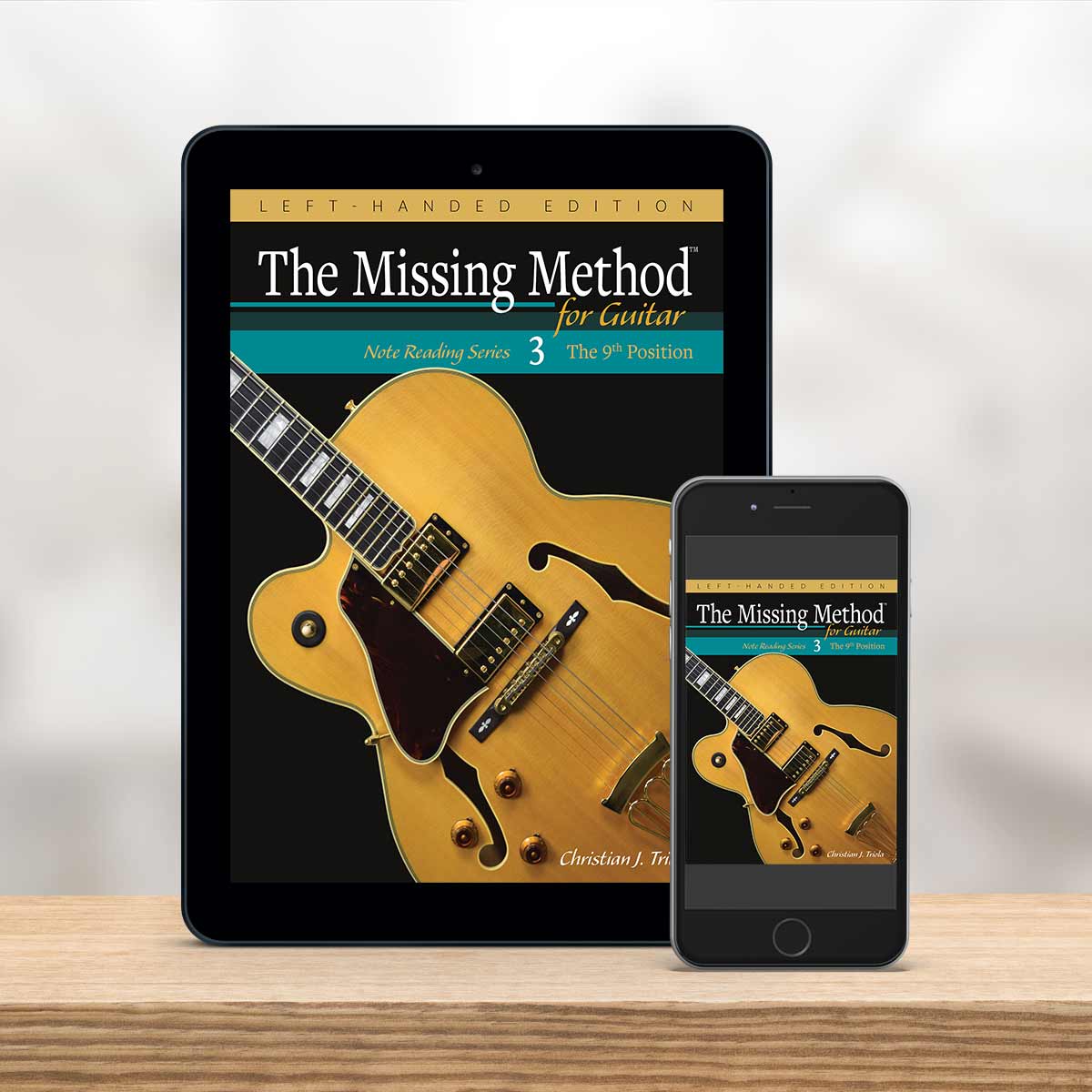 Digital Tablet and smartphone showing the cover of The Missing Method for Guitar Note Reading Series Book 3, Left-Handed Edition by Christian Triola