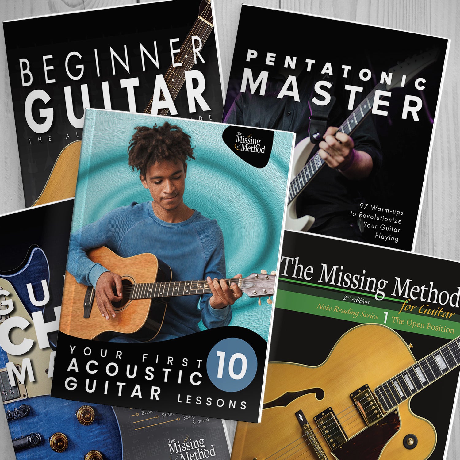 A display of Missing Method for Guitar books on a table.
