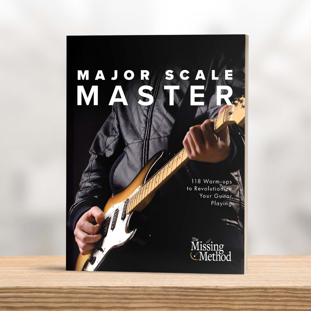 Major Scale Master from The Missing Method for Guitar. Image of paperback book upright on a shelf, front cover facing out.