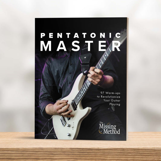 Pentatonic Master from The Missing Method for Guitar. Book displayed on a shelf, showcasing the front cover.
